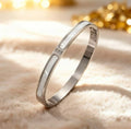 Armband aus weißem Perlmutt und Silberauflage
